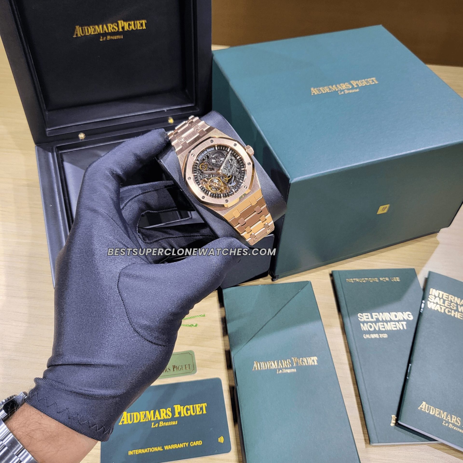 Fake AP Royal Oak watch with rose gold case and intricate openworked movement