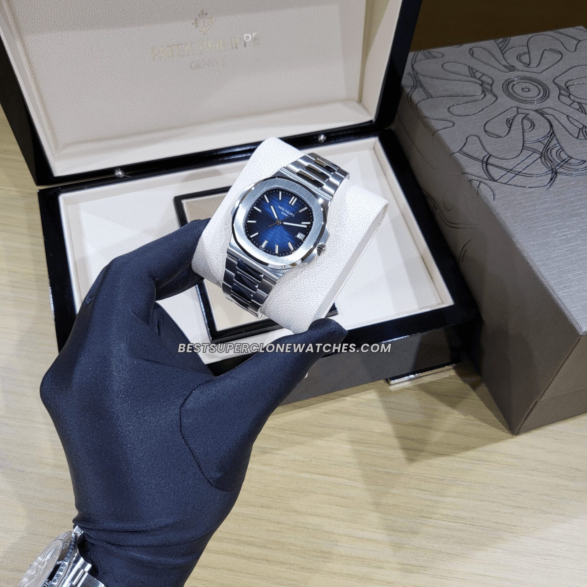 Replica Patek Philippe Nautilus in white gold finish with sunburst blue dial