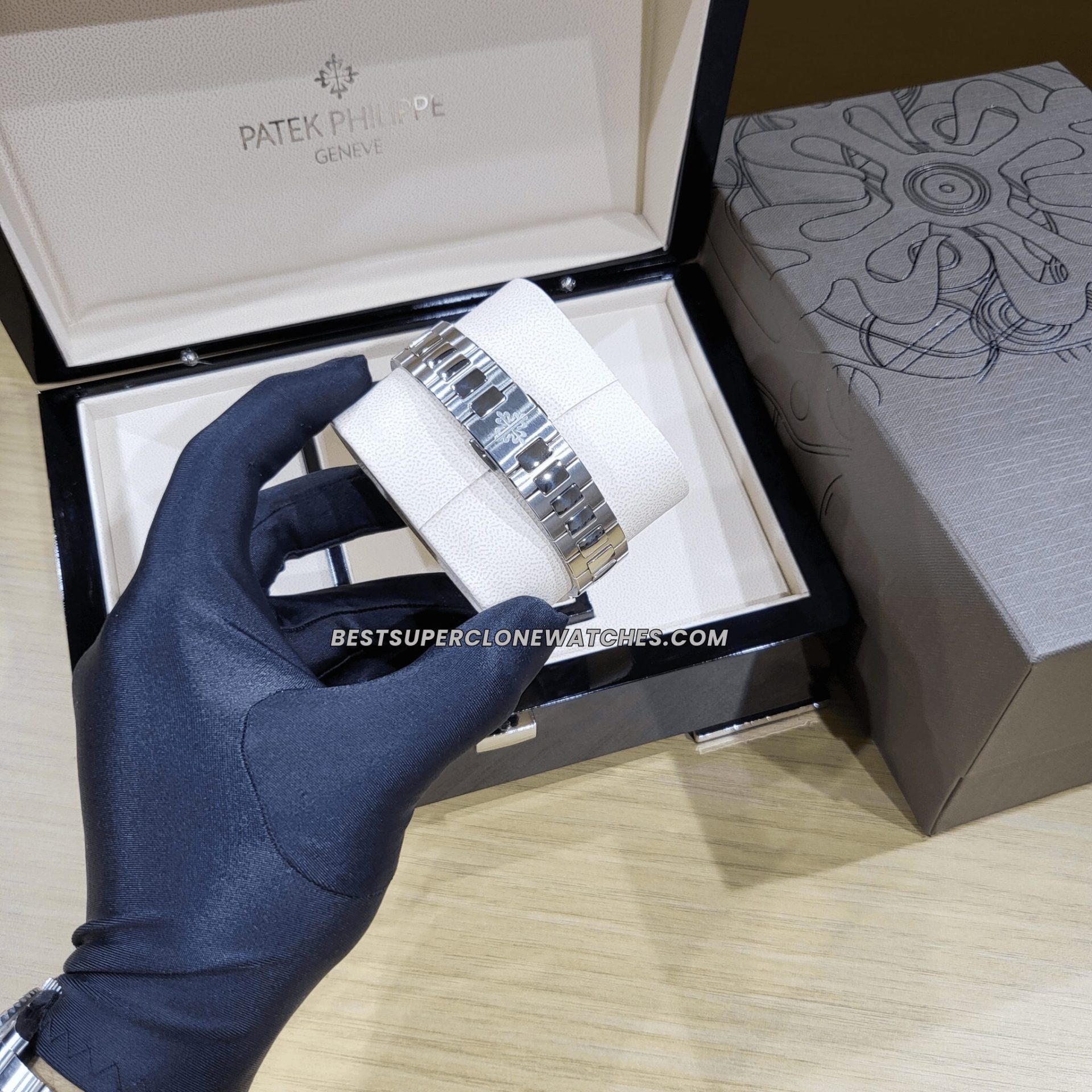 Swiss super clone of white gold Nautilus watch with integrated bracelet and date display