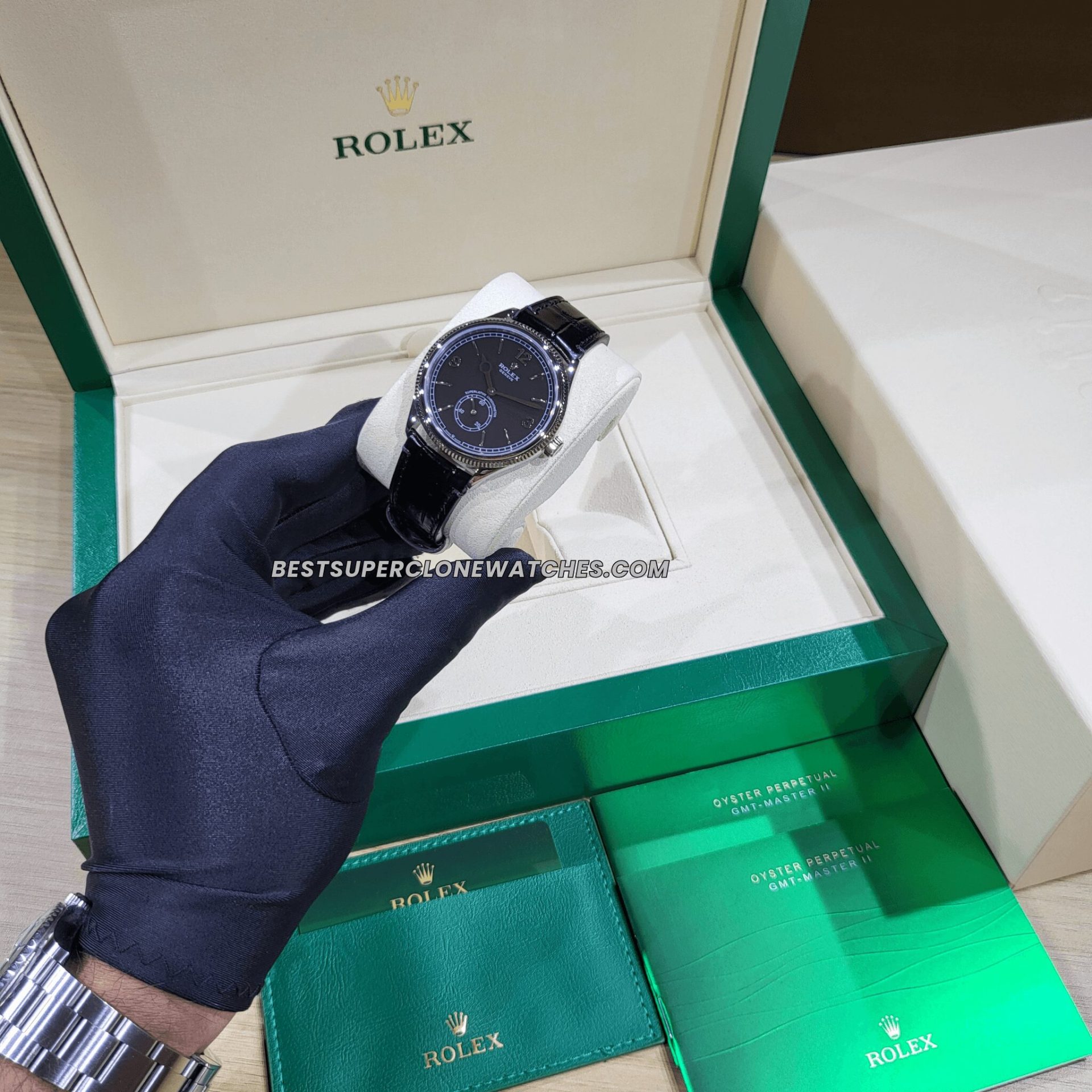 Replica Rolex 1908 18kt white gold with intense black dial and alligator strap, featuring 7140 movement clone