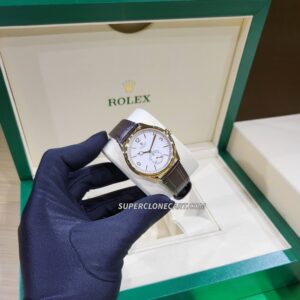 Detail shot of alligator leather strap with fine texture and polished clasp on fake Rolex 1908