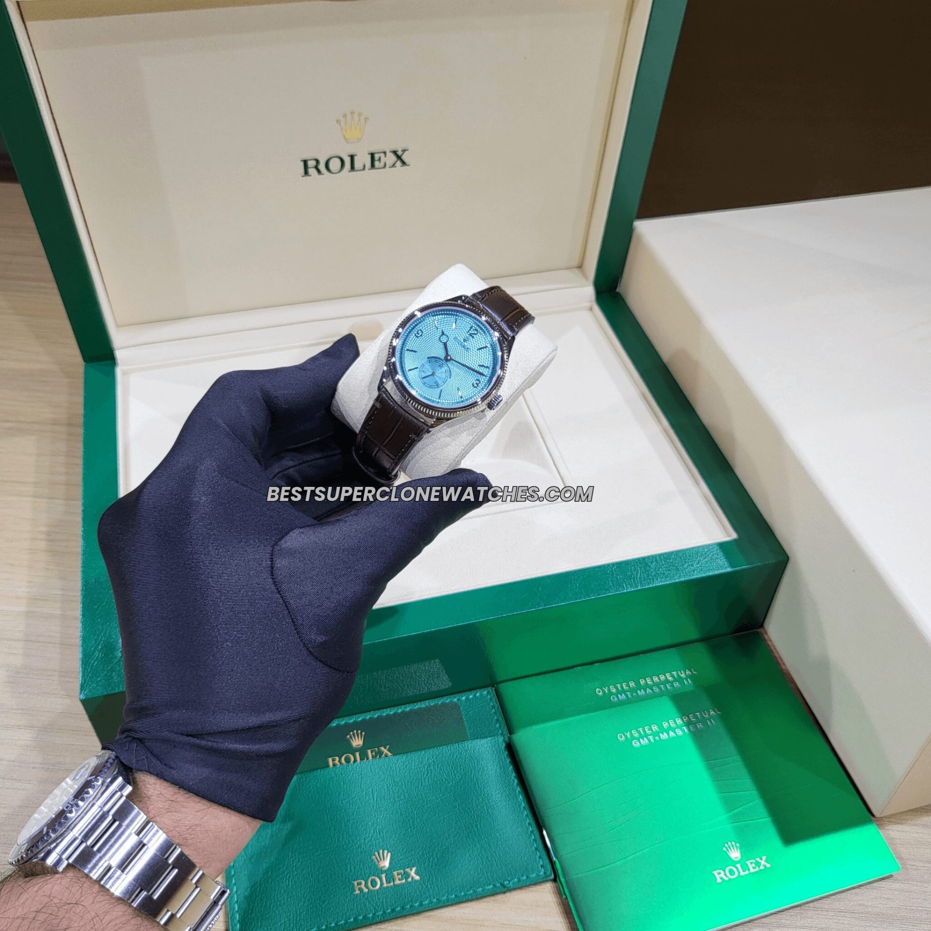 Replica Rolex 1908 Platinum with ice blue dial and alligator strap, featuring 7140 movement clone