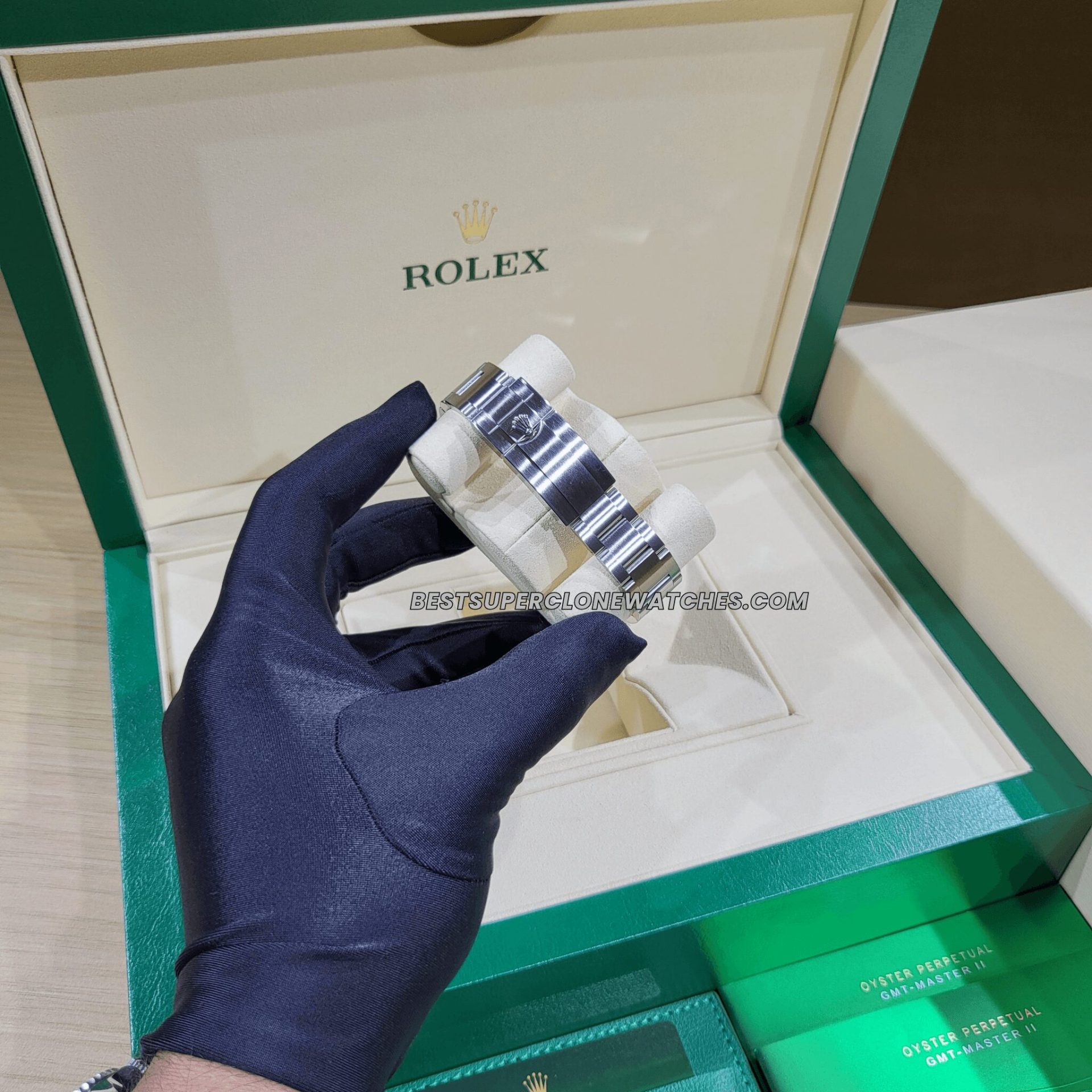 High-quality replica Rolex Air-King showing luminous hands and minute markers on black dial