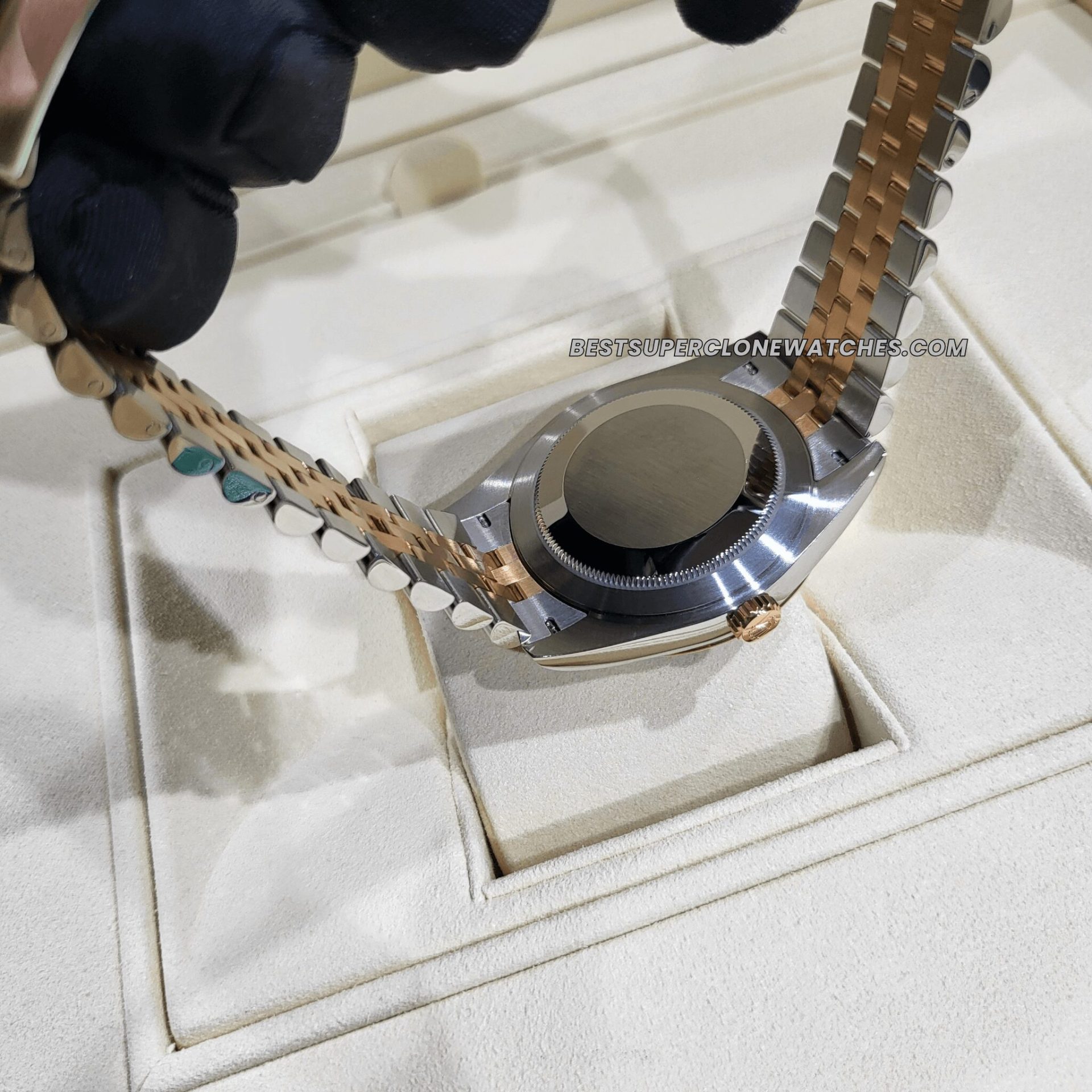 Detailed view of the fake Rolex Datejust Ref-126331 with chocolate diamond-set dial, Oystersteel, and Everose gold design—super clone edition.