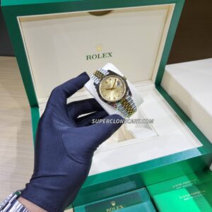 Rolex Datejust 3235 Swiss super clone with champagne dial, diamonds, yellow gold bezel, and Oystersteel case—luxury replica watch.