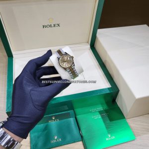 Side view of super clone Rolex Datejust 278271 with 31mm Oystersteel and Everose Gold case and polished finish