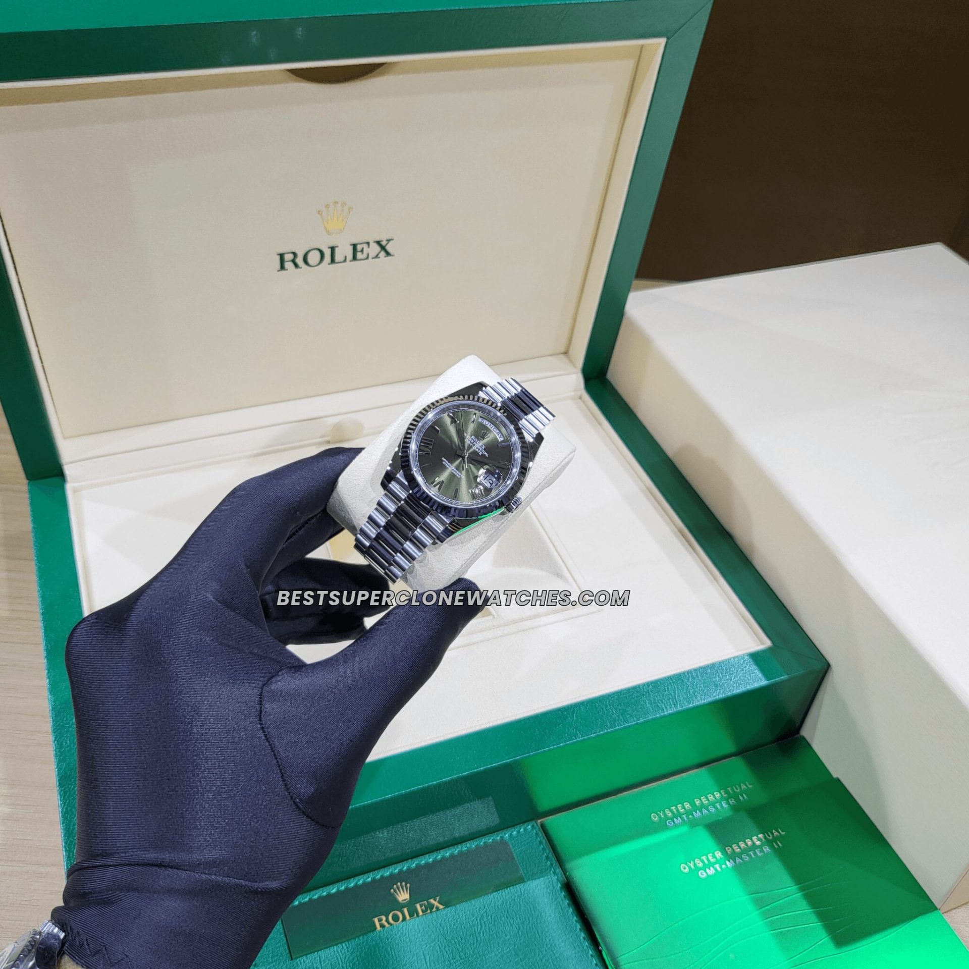 Luxury fake Rolex Day-Date 228236 with olive green dial and fluted platinum bezel