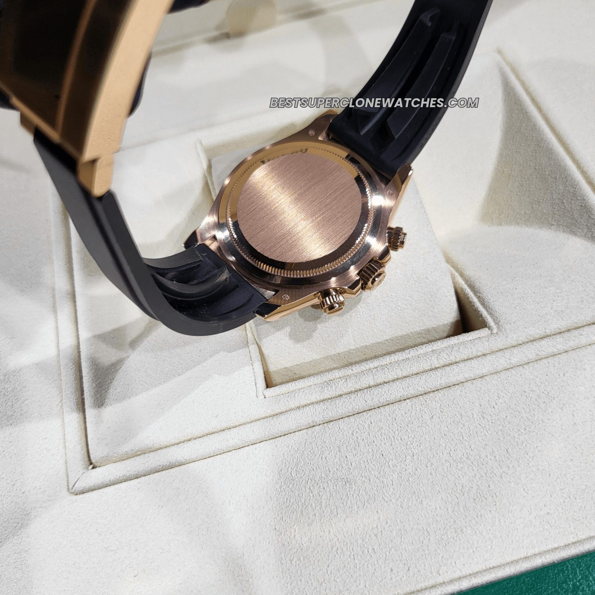 Close-up of Rolex Daytona super clone with sundust and black dial and Everose gold case