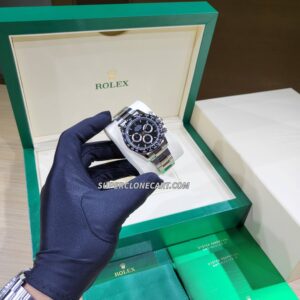 Replica Rolex Daytona with 4131 clone movement featuring panda-style black and white dial
