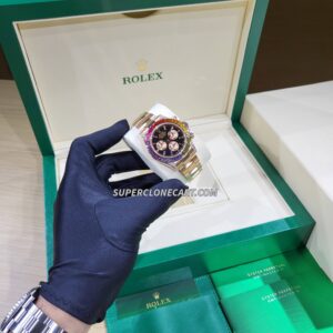 Luxury fake Rolex Daytona with diamond-set rainbow bezel and black dial on Everose gold case