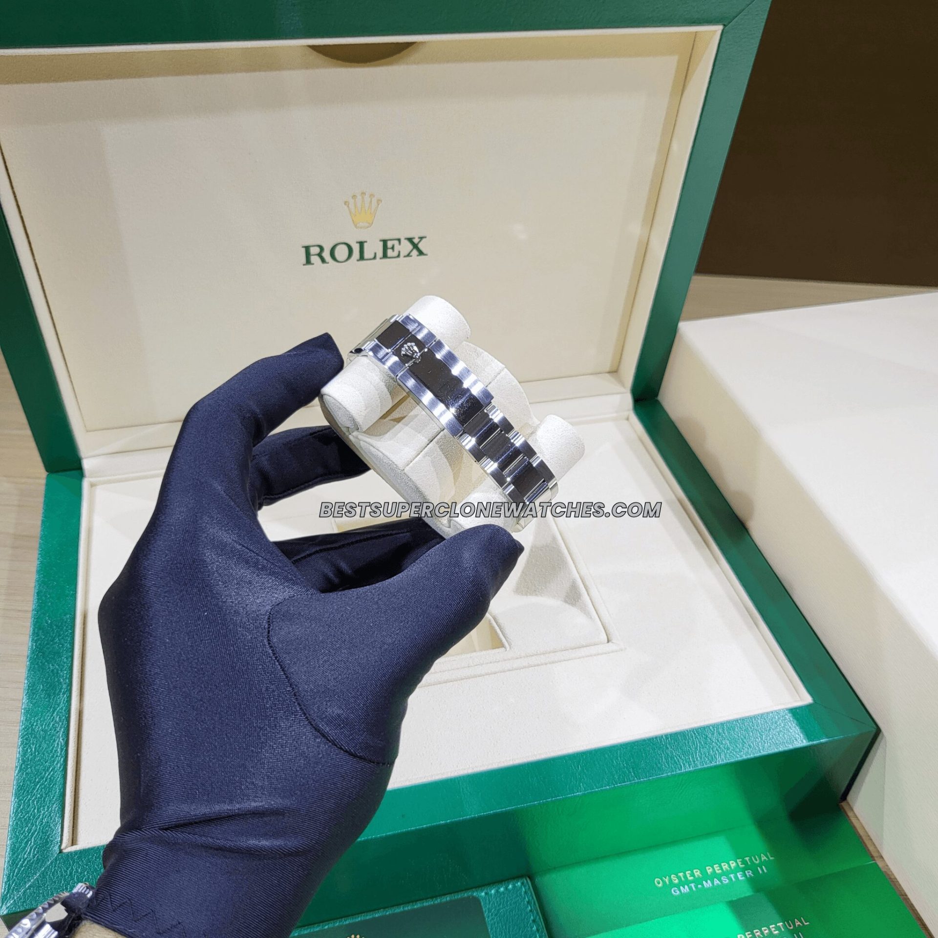 Luxury fake Rolex GMT Master II 126710BLNR featuring oystersteel bracelet and luminous markers