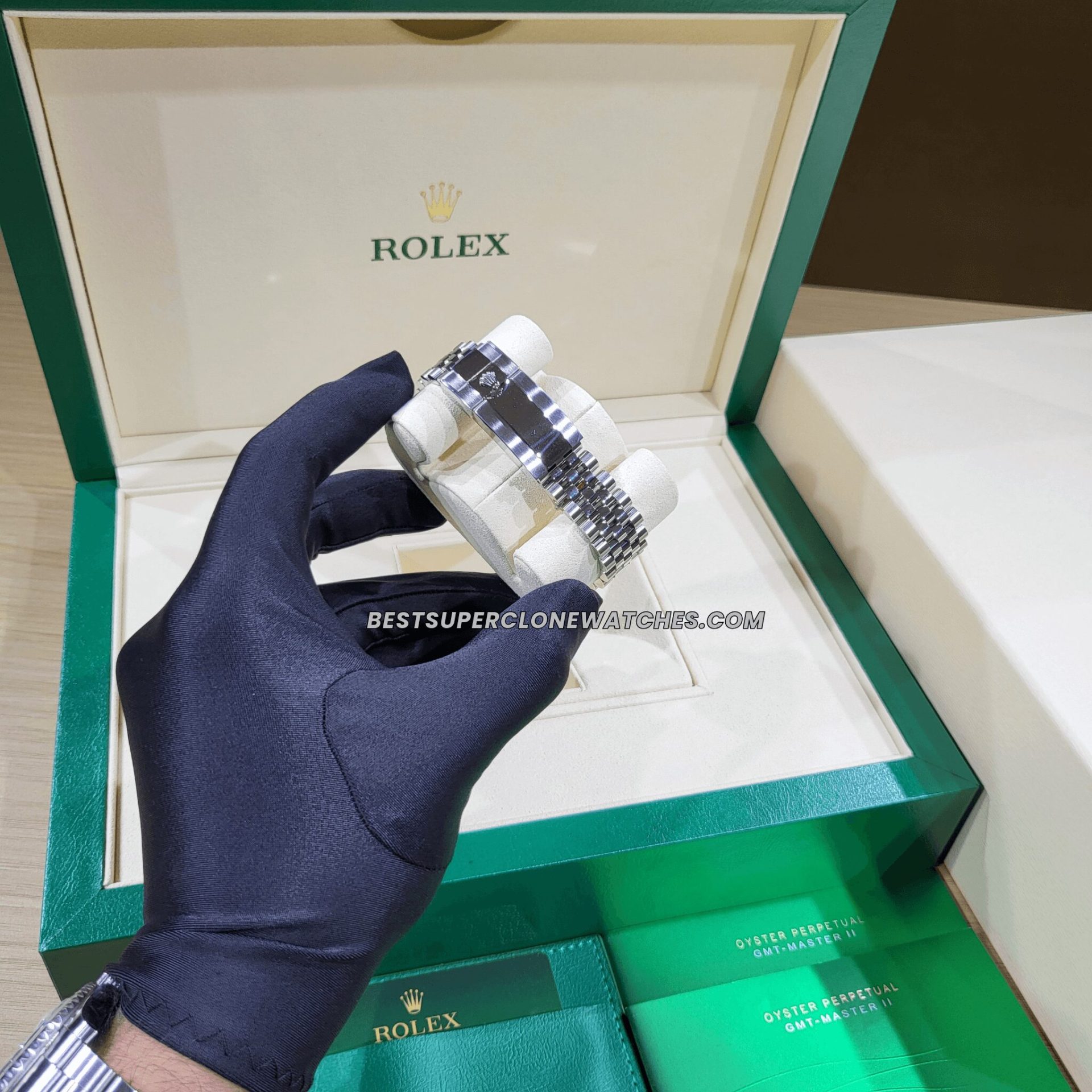Luxury fake Rolex GMT Master II 126710BLNR featuring jubilee bracelet and luminous markers