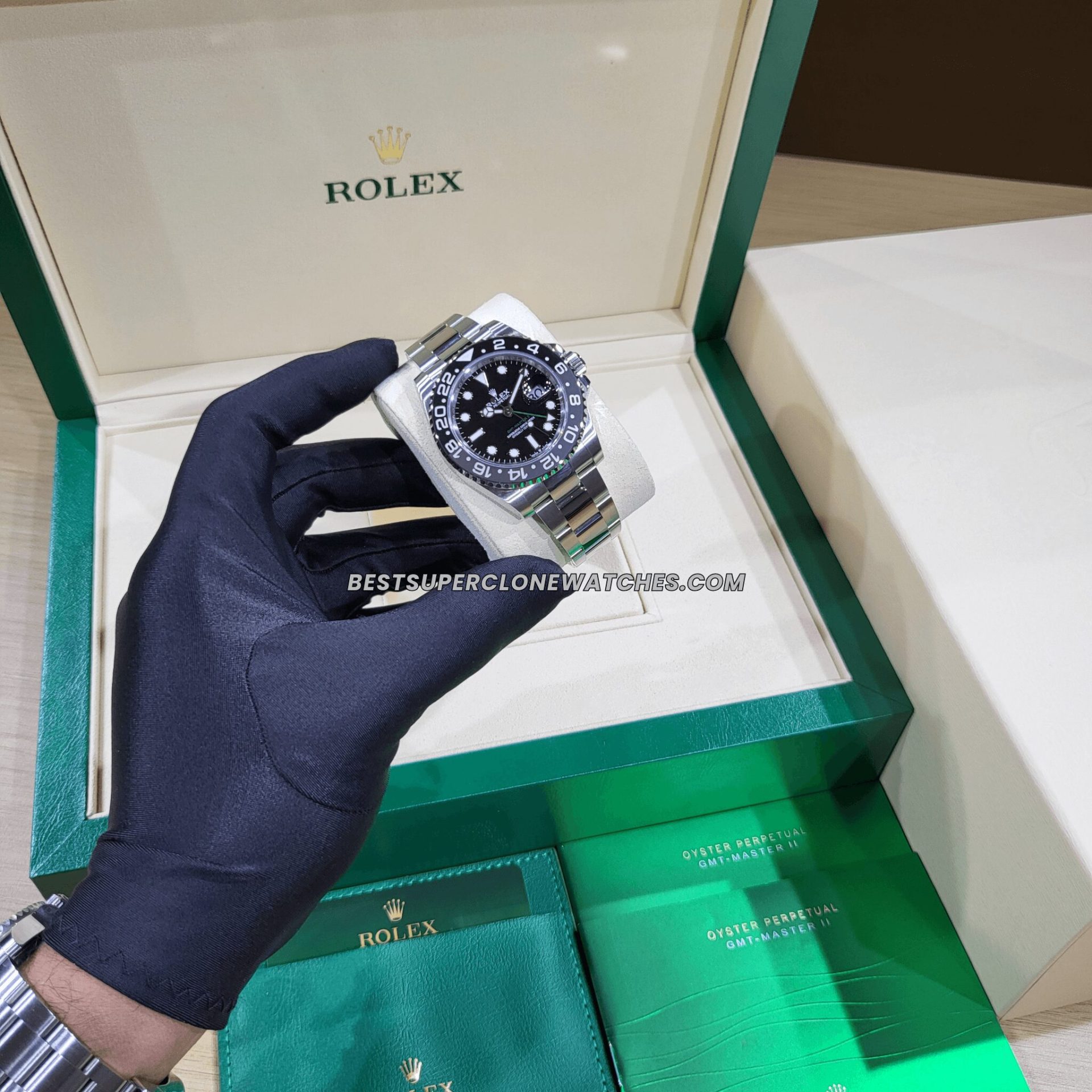 Close-up of Rolex GMT Master II super clone with black dial and oystersteel bracelet