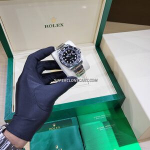 Close-up of Rolex GMT Master II super clone with black dial and oystersteel bracelet