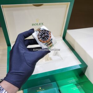 Close-up of Rolex GMT Master II super clone with black dial and cyclops date magnifier