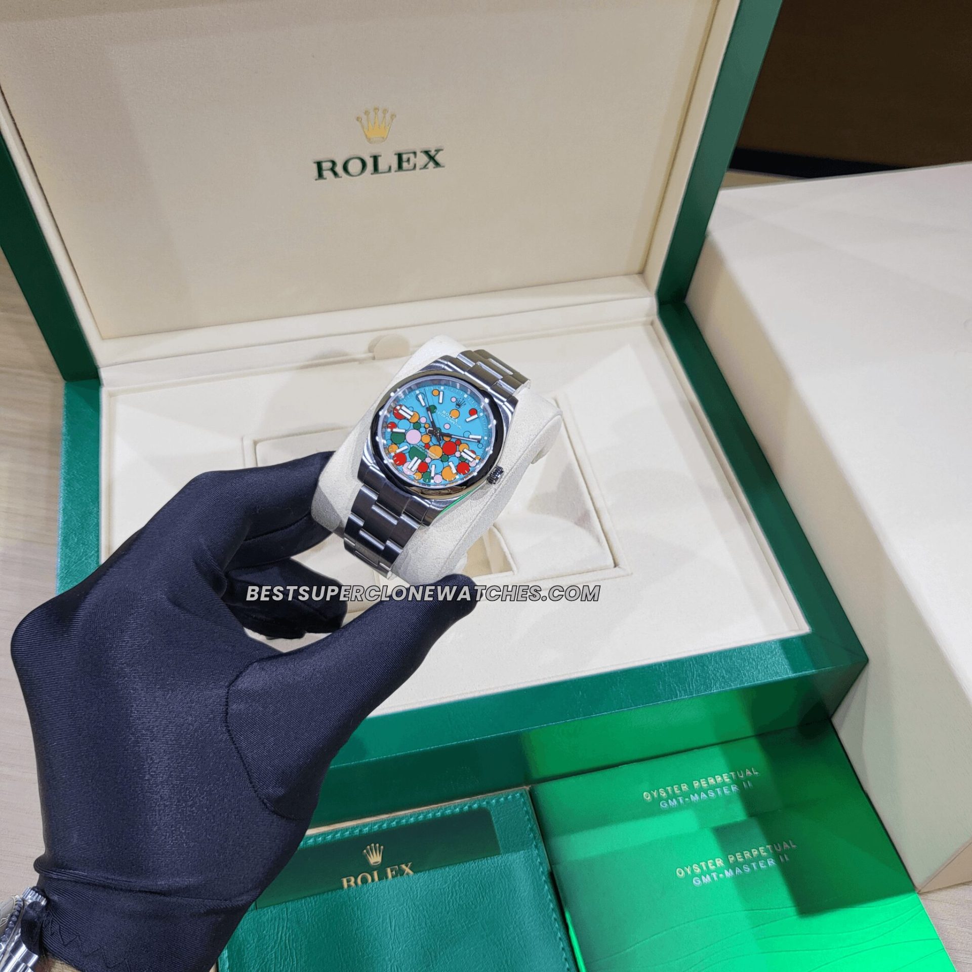 Super clone Rolex Oyster Perpetual 124300 featuring turquoise blue dial with celebration motif and stainless steel case