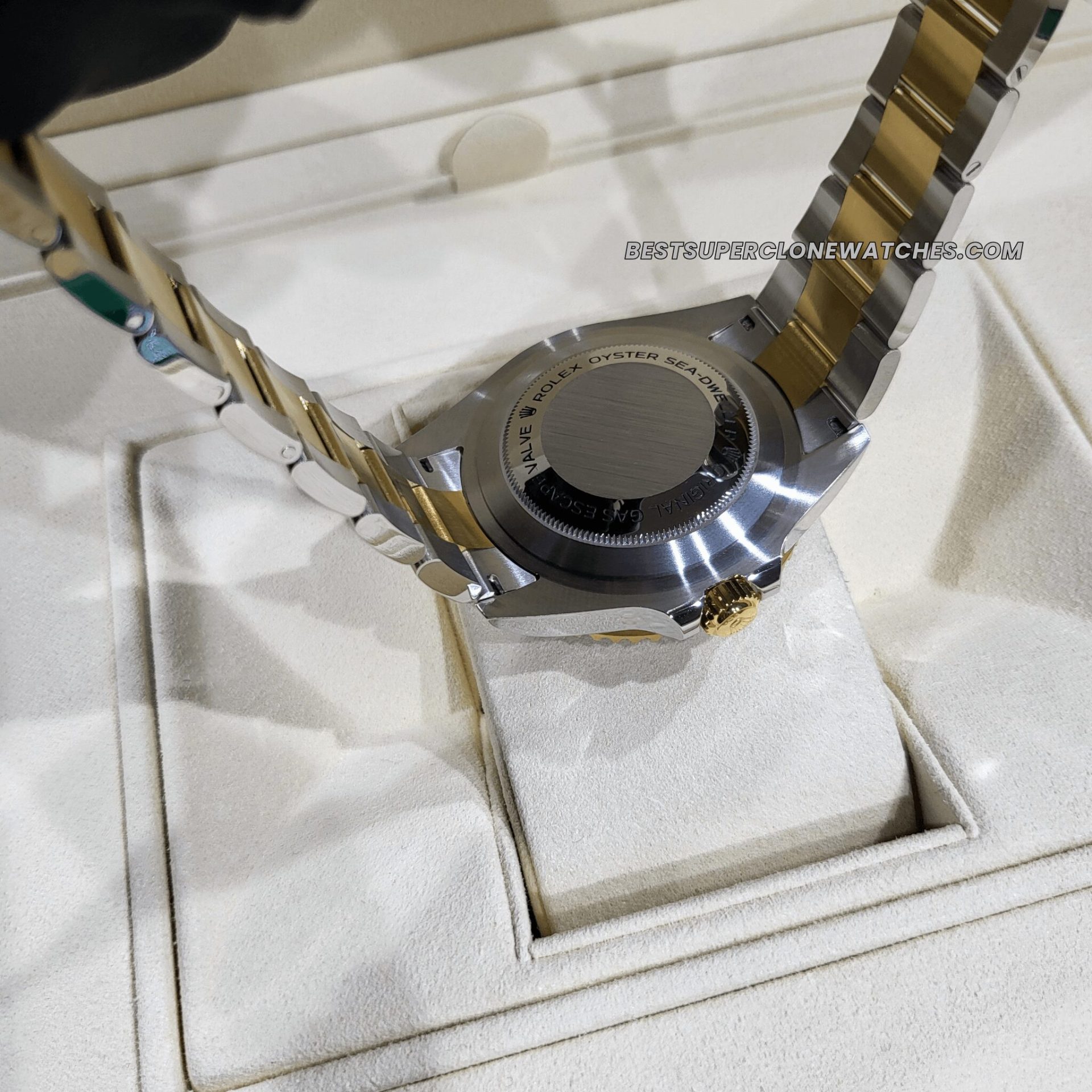 Back view of replica Rolex Sea-Dweller with solid case back and 3235 movement clone visible