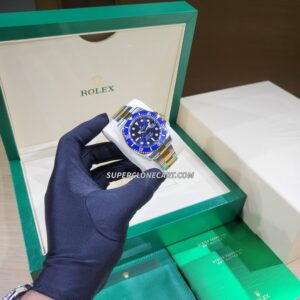 Fake Rolex Submariner 2-Tone Ref-126613LB with royal blue dial, Oystersteel and yellow gold case, and Swiss 3235 movement—high-quality super clone.