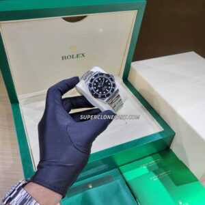 Side view of super clone Rolex Sea-Dweller with brushed Oystersteel case and sturdy bracelet links