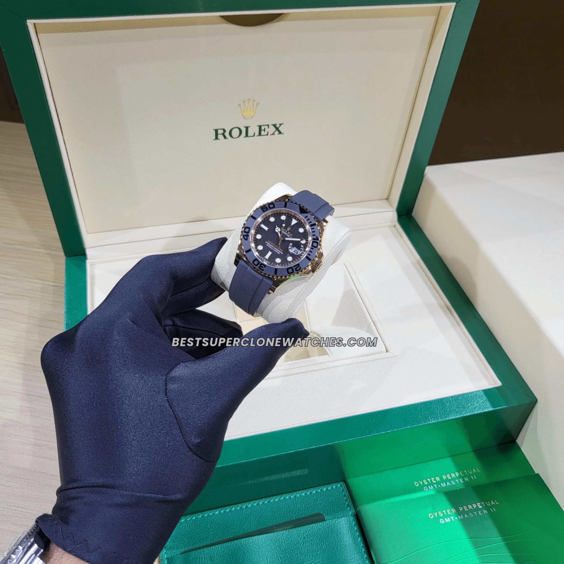 Fake Rolex Yacht-Master watch with luxurious Everose gold case, black dial, and 3235 movement imitation