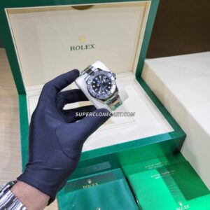 Detail shot of the polished Oystersteel bracelet and platinum accents on fake Rolex Yacht-Master 126622